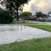 Melaleuca Isles Neighborhood Park (swings)